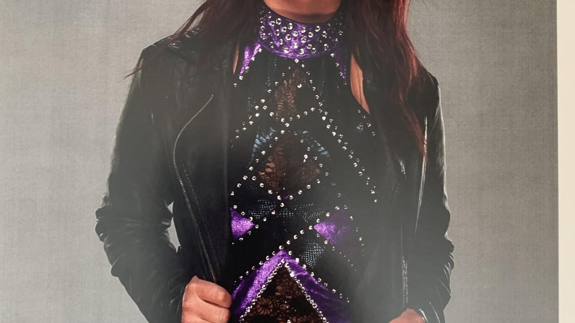 Black and purple gear front pose 8×10